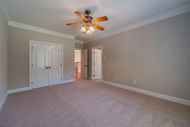 an aerial view of a house with outdoor space