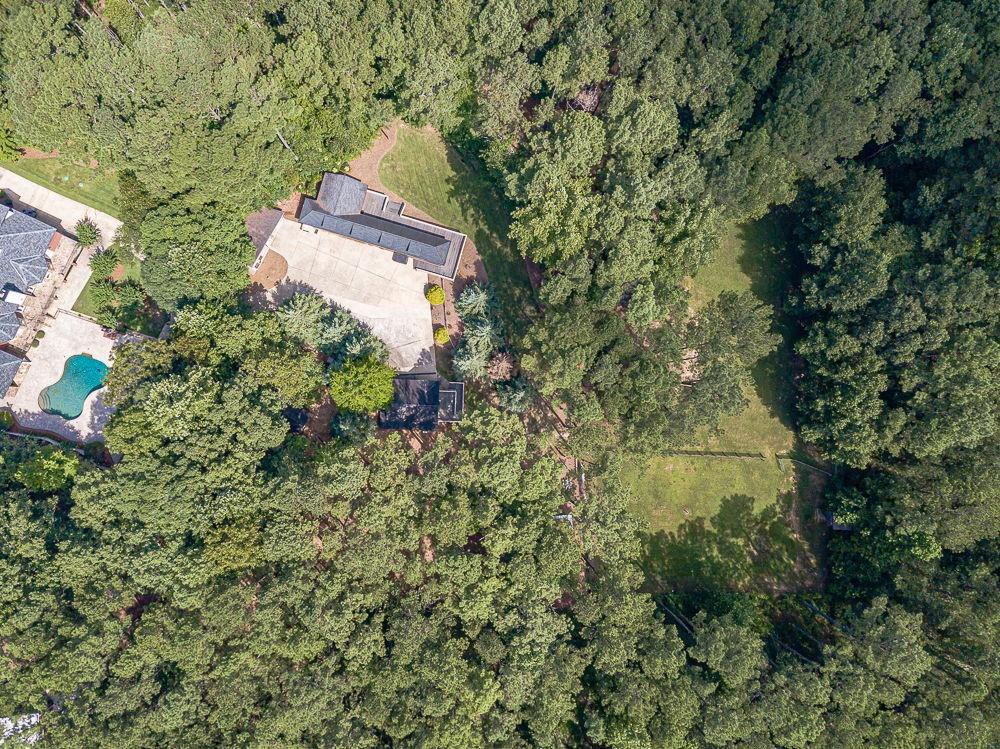 2431 Rabbit Farm Circle Loganville, GA 30052 - Photo 65 of 65 an aerial view of a house with a yard