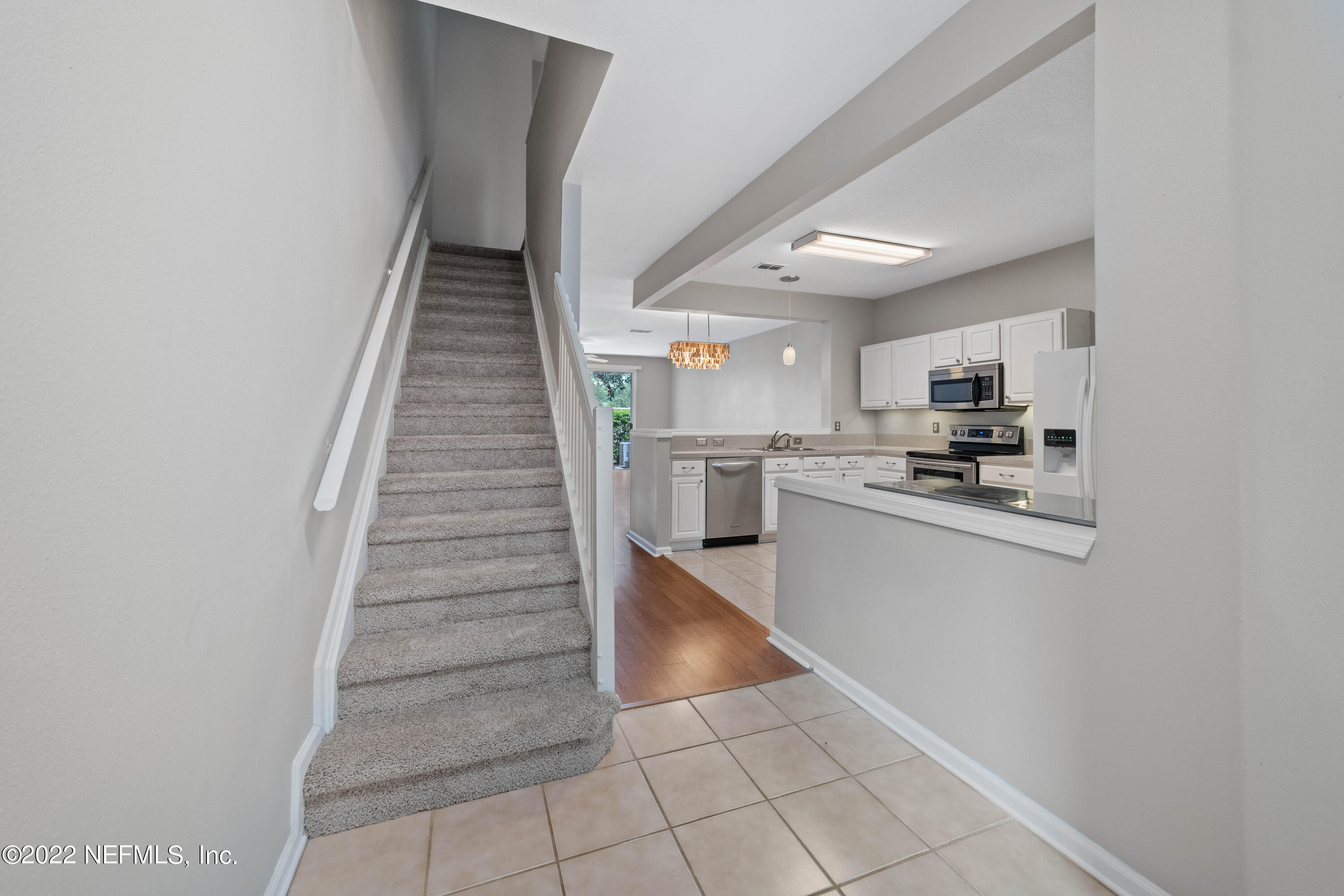 7990 Baymeadows Road East, Unit 1203 Jacksonville, FL 32256 - Photo 13 of 37 to upsairs level