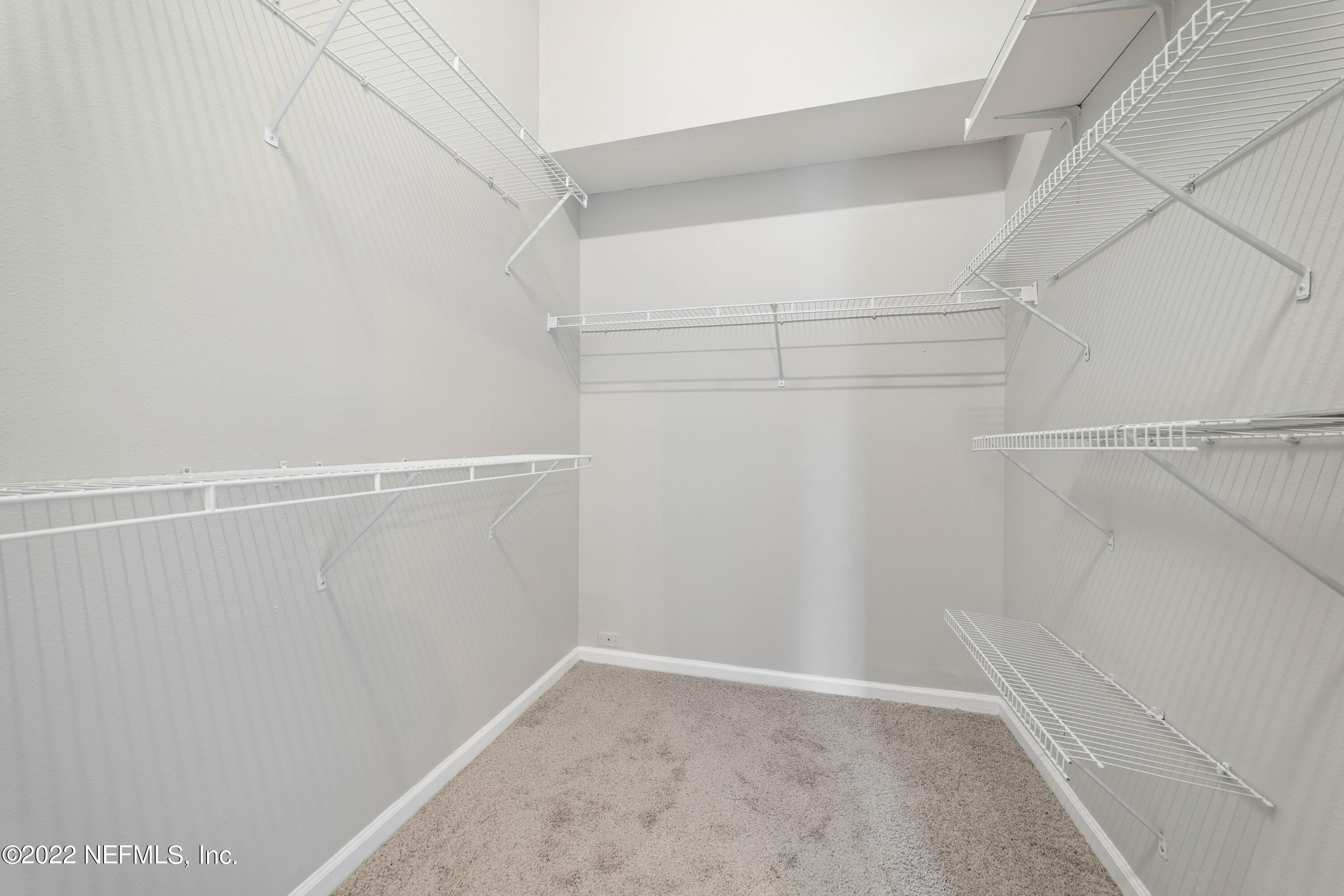7990 Baymeadows Road East, Unit 1203 Jacksonville, FL 32256 - Photo 16 of 37 Master closet