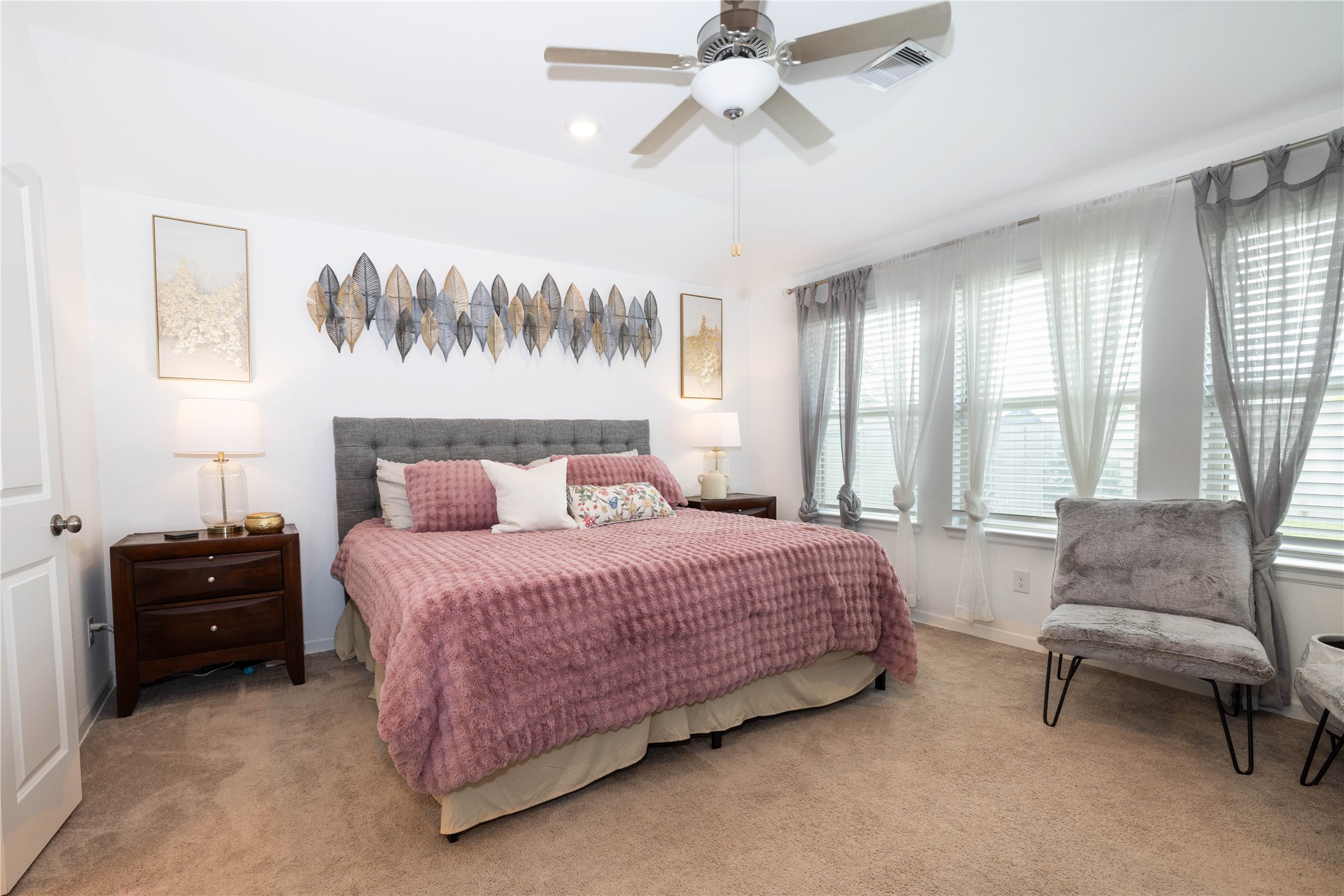 5715 Prairie Chapel Road Katy, TX 77493 - Photo 13 of 30 a bedroom with a bed and a couch