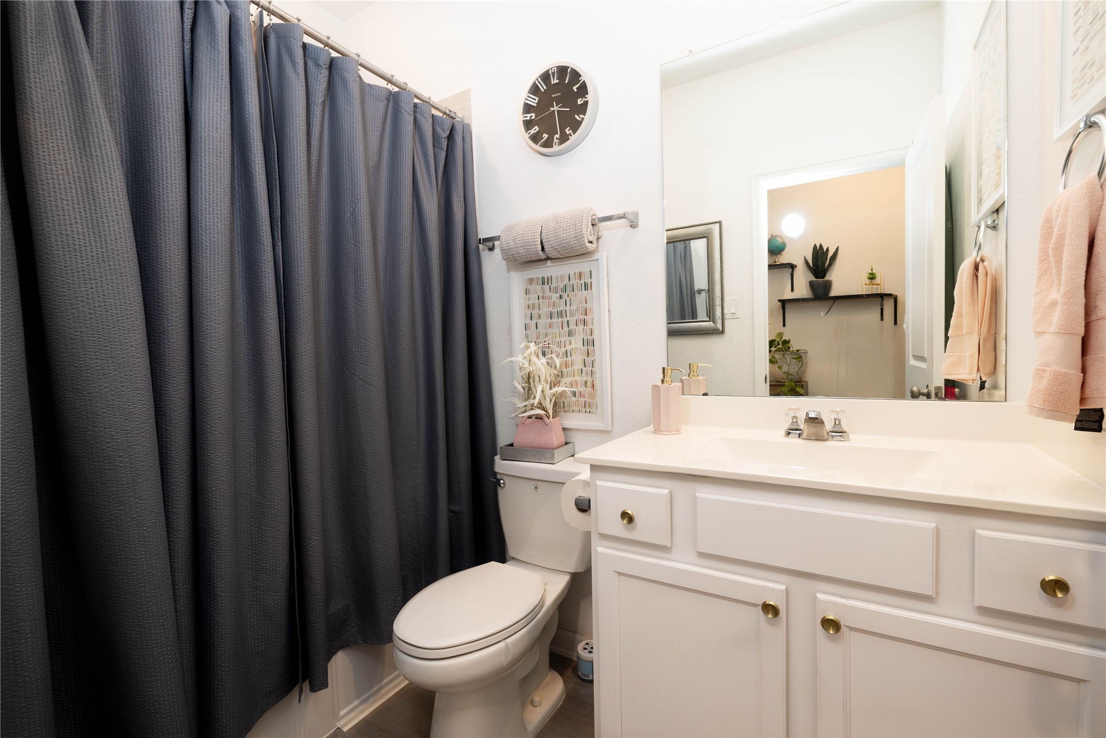 5715 Prairie Chapel Road Katy, TX 77493 - Photo 18 of 30 a bathroom with a sink a toilet and shower
