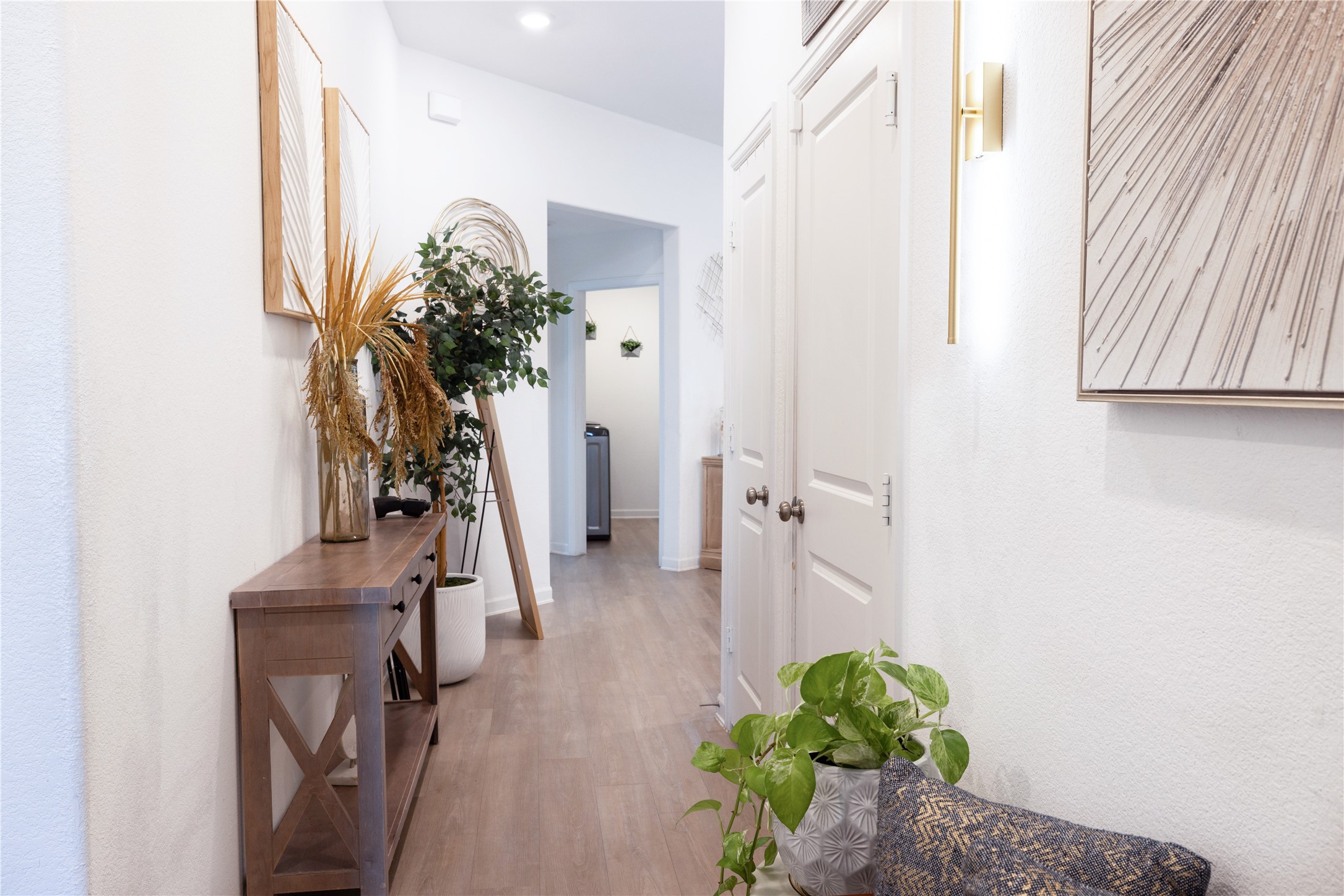 5715 Prairie Chapel Road Katy, TX 77493 - Photo 4 of 30 a view of a hallway with flower pot