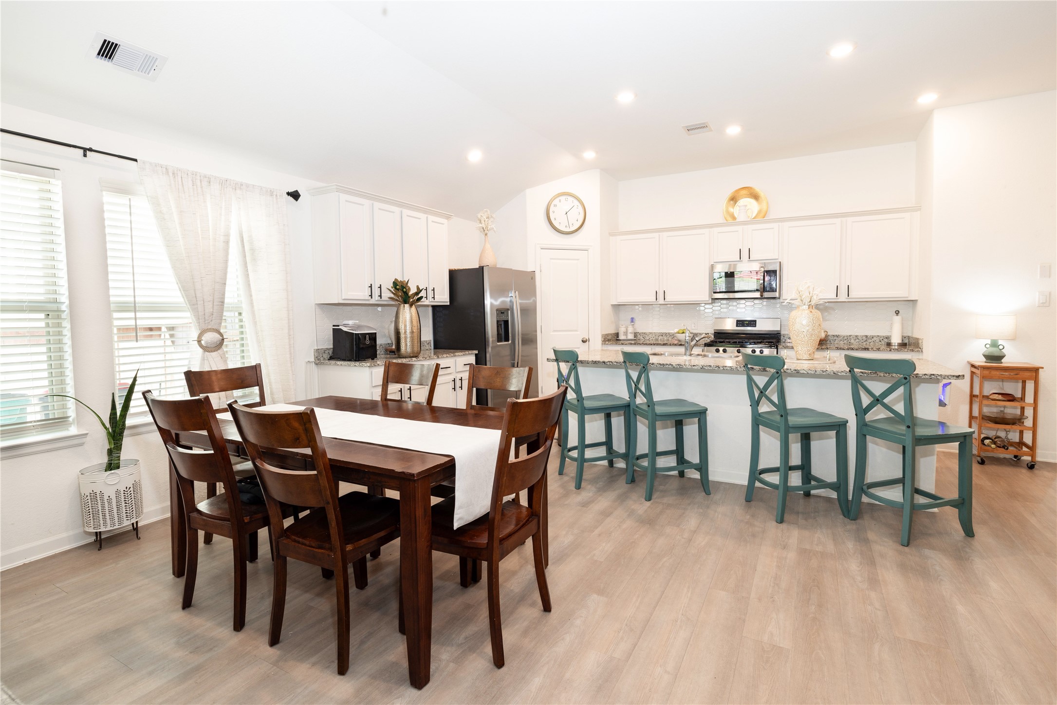 5715 Prairie Chapel Road Katy, TX 77493 - Photo 8 of 30 a view of a dining room with furniture