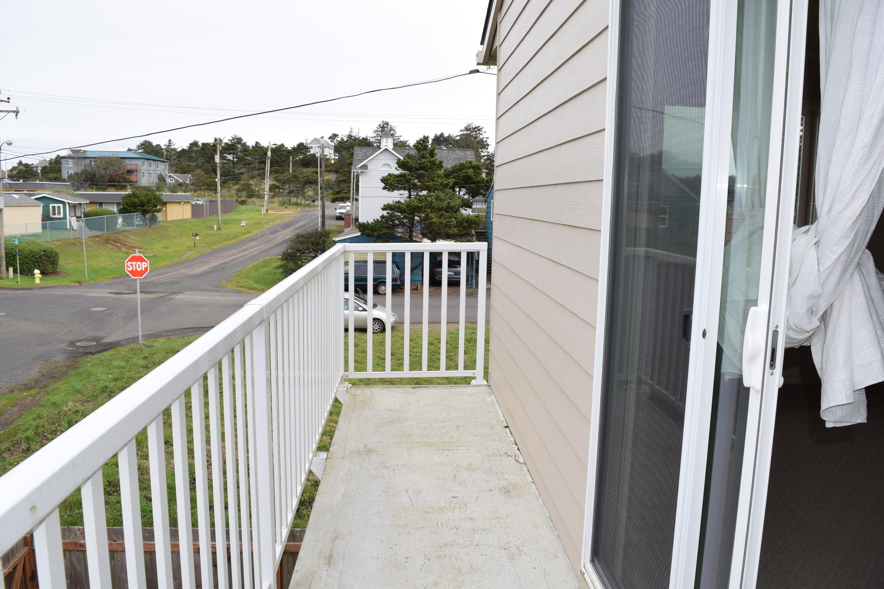911 Southwest 12th Street Newport, OR 97365 - Photo 23 of 29 Bedroom 1 Porch