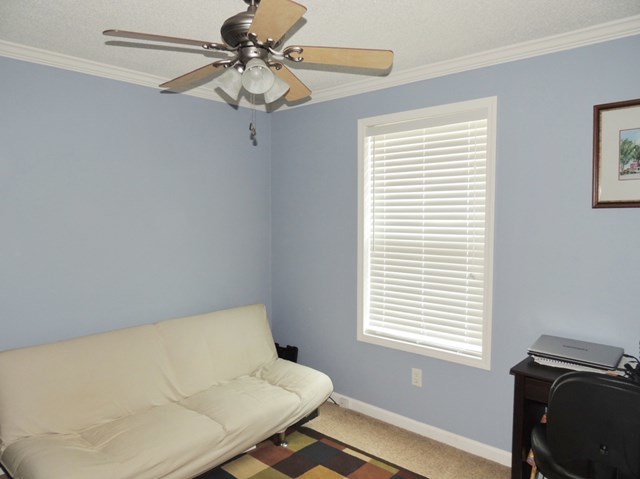 627 Old Cabaniss Road Forsyth, GA 31029 - Photo 12 of 20 a workspace with furniture and a window