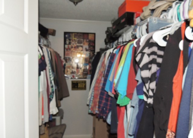 627 Old Cabaniss Road Forsyth, GA 31029 - Photo 10 of 20 a view of walk in closet with clothes and shoes