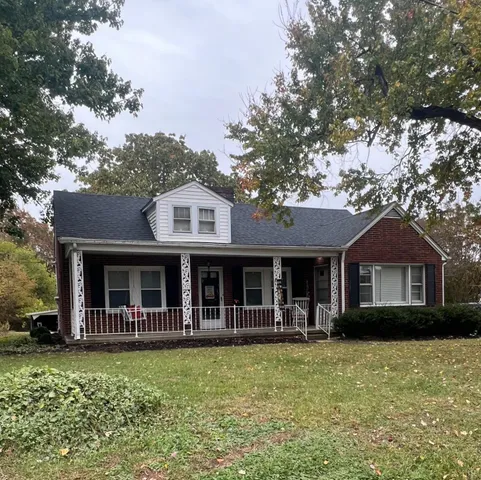 a view of a house with a swimming pool