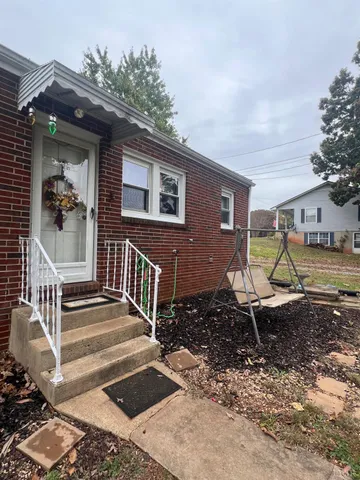 a house with trees in front of it
