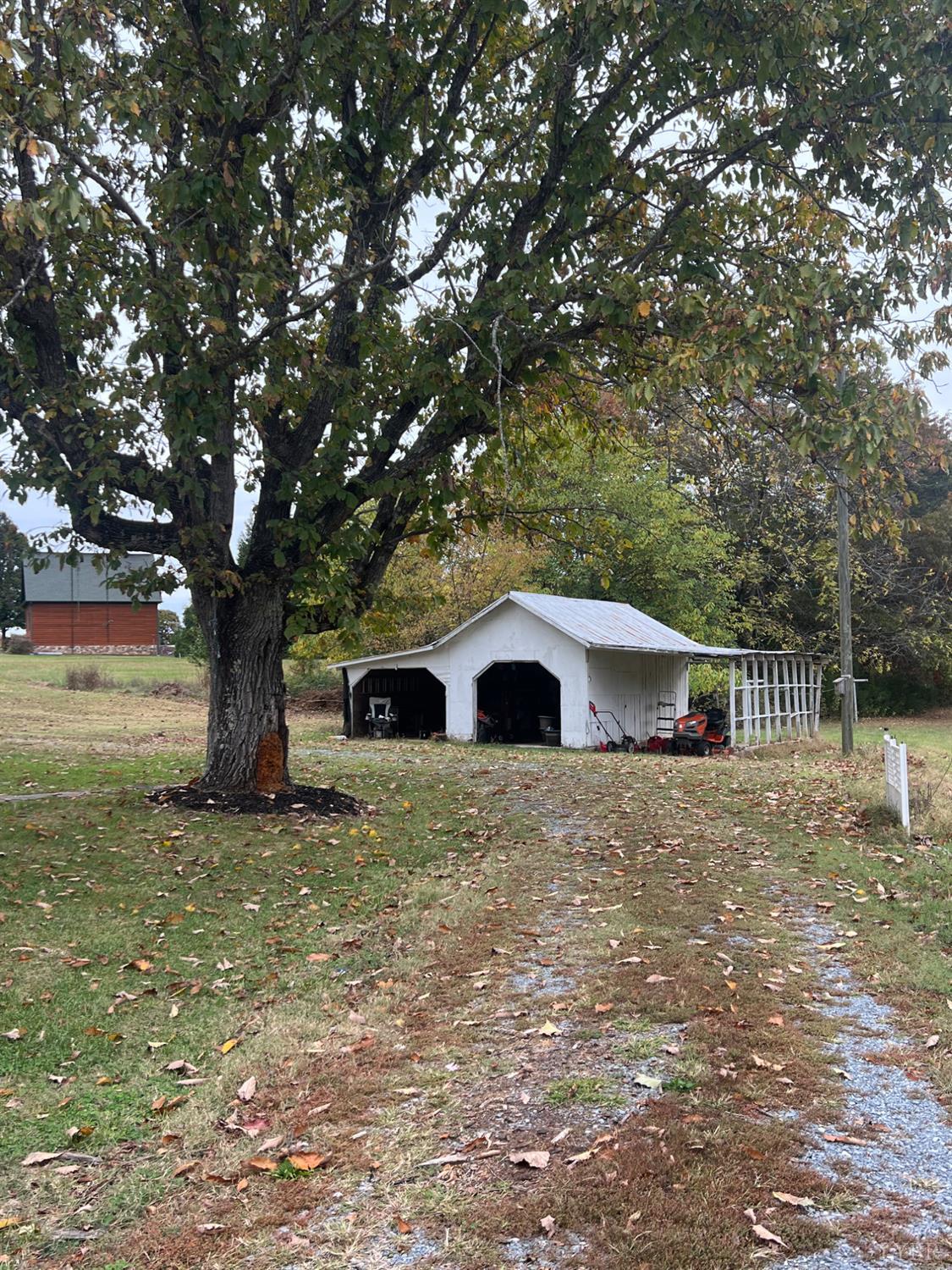 1573 Grit Road Hurt, VA 24563 - Photo 20 of 31 a house with trees in front of it