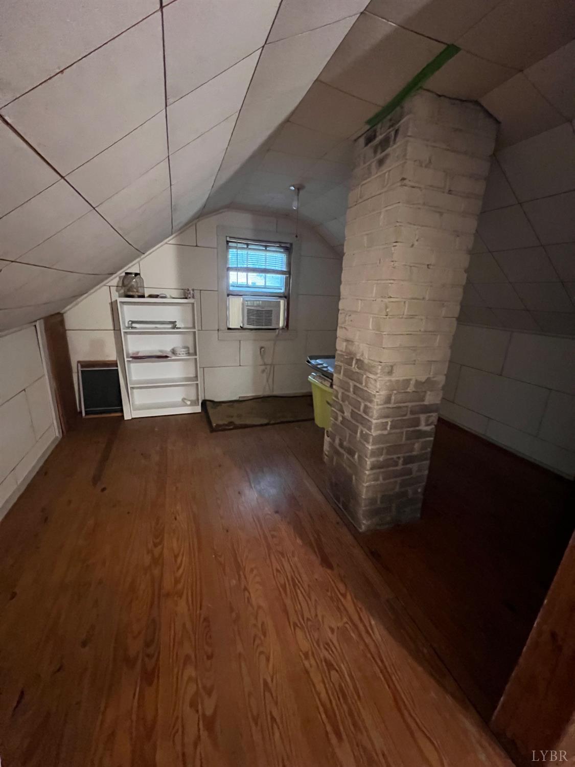 1573 Grit Road Hurt, VA 24563 - Photo 24 of 31 a view of a livingroom with an empty space and a window