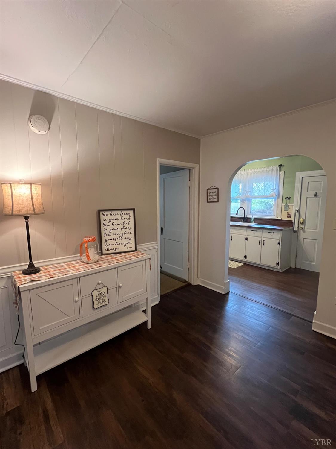 1573 Grit Road Hurt, VA 24563 - Photo 8 of 31 a view of a bedroom with furniture and wooden floor