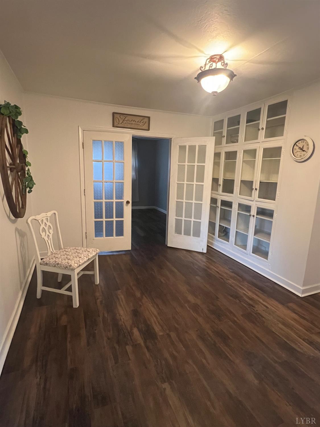 1573 Grit Road Hurt, VA 24563 - Photo 9 of 31 wooden floor in an empty room with a window