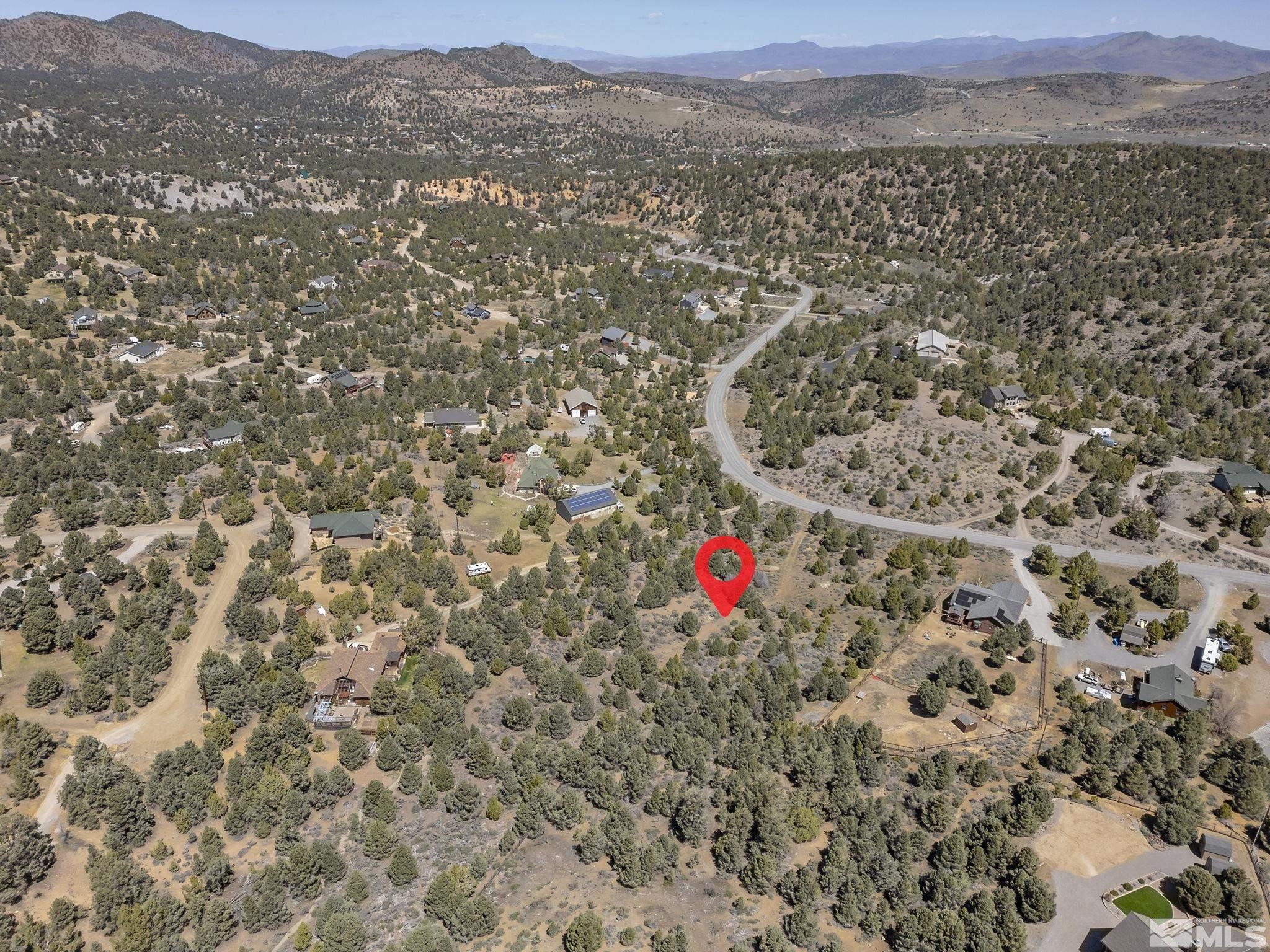 1850 Lousetown Road Reno, NV 89521 - Photo 13 of 14 a view of a field with mountains in the background