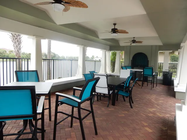 a living room with furniture rug and window