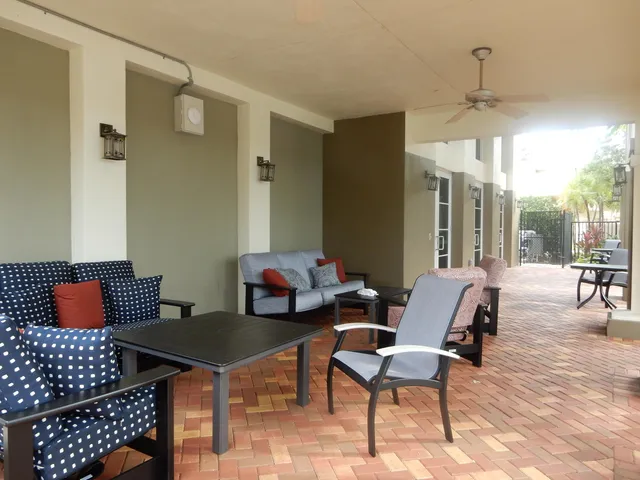an aerial view of a house with a garden