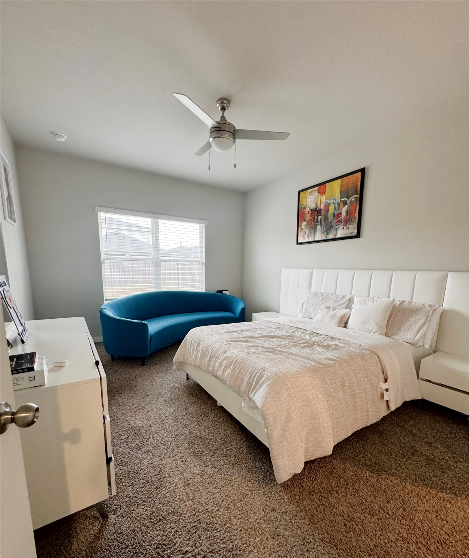 12711 Basinghall Lane Houston, TX 77047 - Photo 11 of 25 a bedroom with bed and window