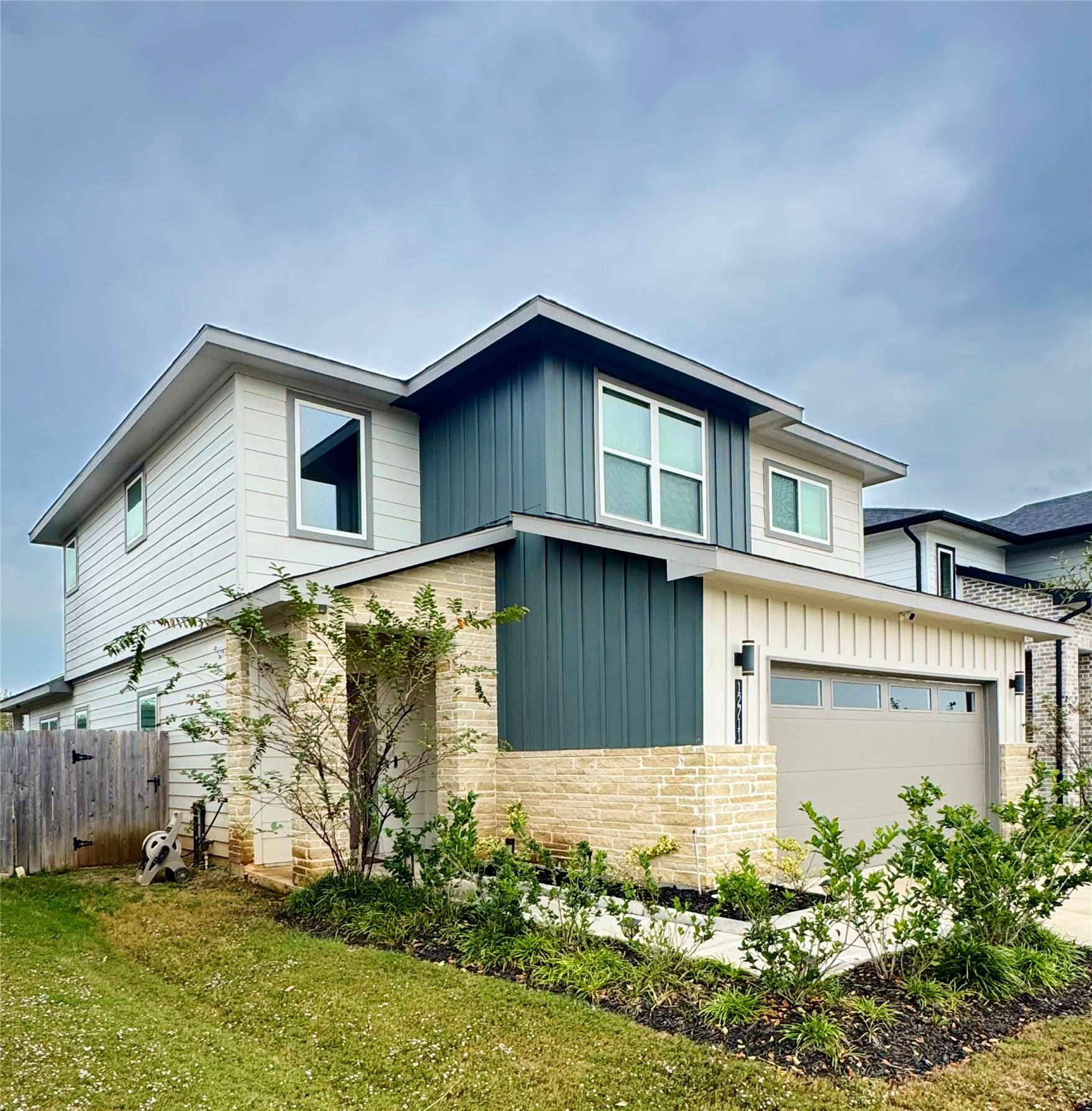 12711 Basinghall Lane Houston, TX 77047 - Photo 2 of 25 a house that has a lot of windows in it