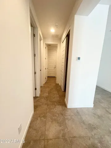 a view of a kitchen with kitchen island