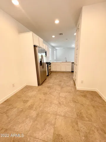 an empty room with a natural light