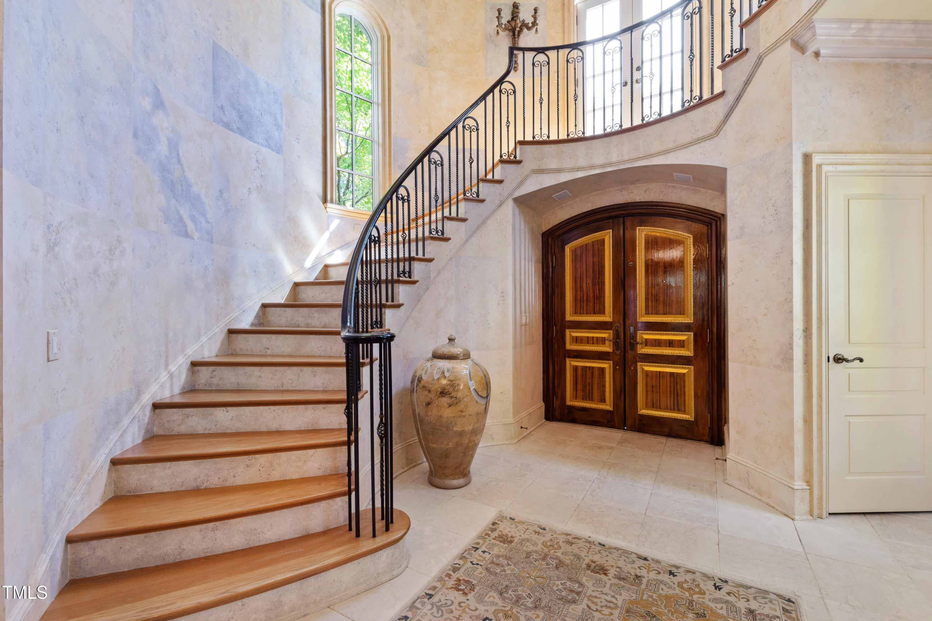 2658 Davis Street Raleigh, NC 27608 - Photo 11 of 99 a view of entryway with wooden floor and stairs