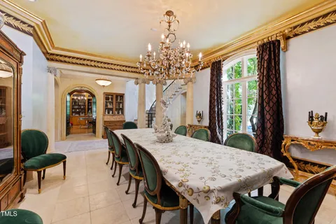 a kitchen that has a sink and a stove