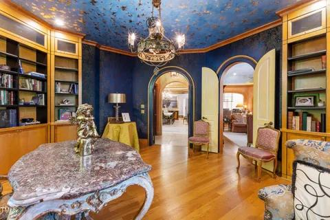 a view of a balcony with furniture