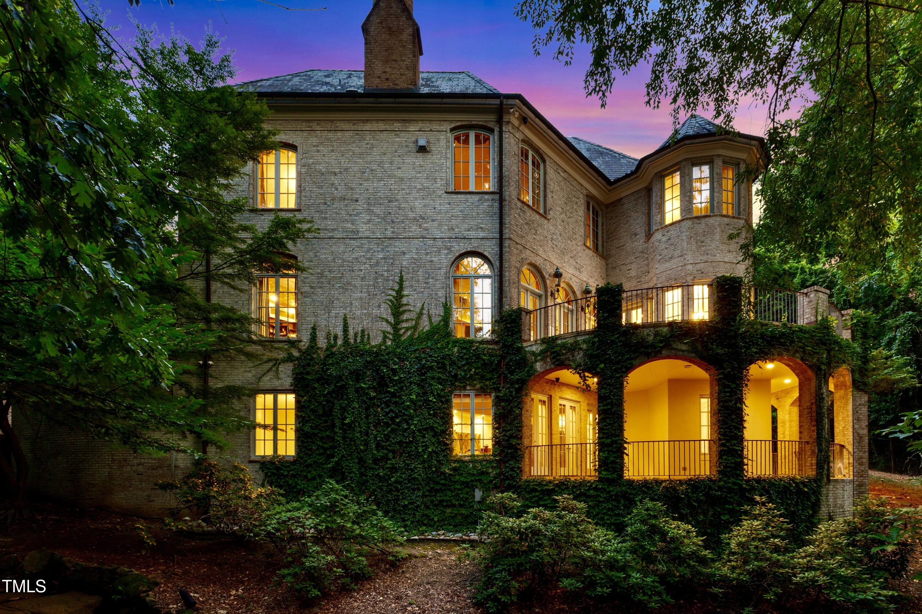 2658 Davis Street Raleigh, NC 27608 - Photo 2 of 99 a front view of a house with lots of green space