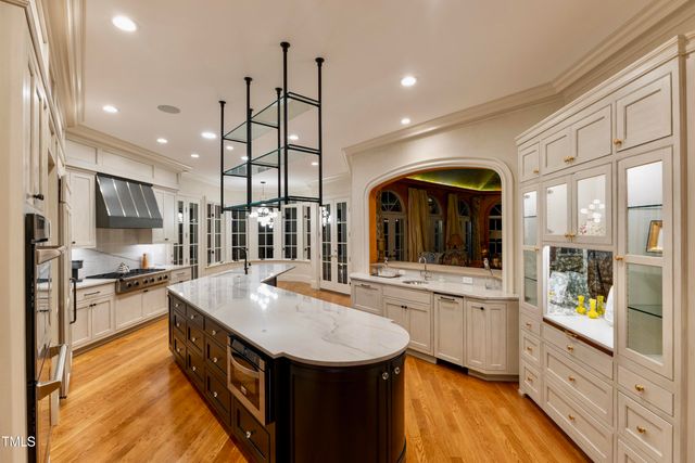 a bathroom with a tub and shower