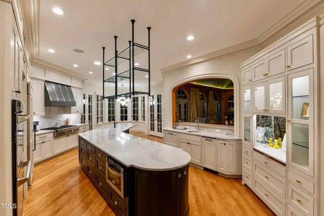 a bathroom with a tub and shower