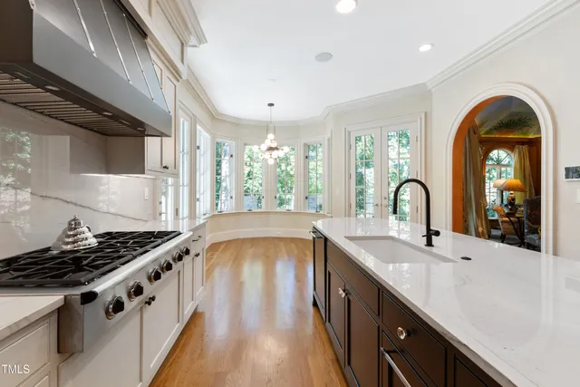 a very nice looking bedroom with a bed and a window