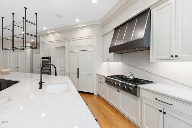 a view of a hallway with wooden shelves