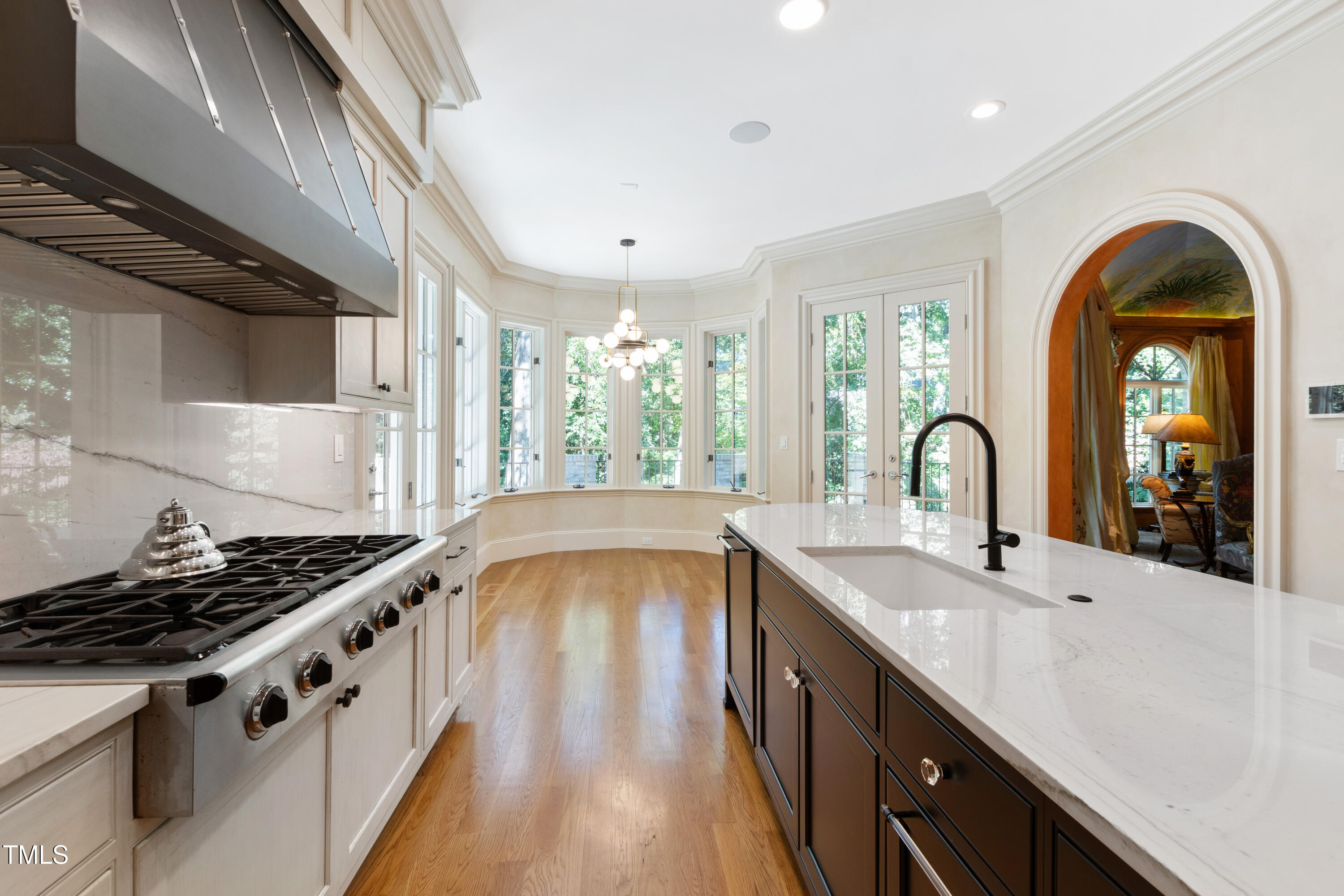 2658 Davis Street Raleigh, NC 27608 - Photo 33 of 99 a kitchen that has a sink and a stove