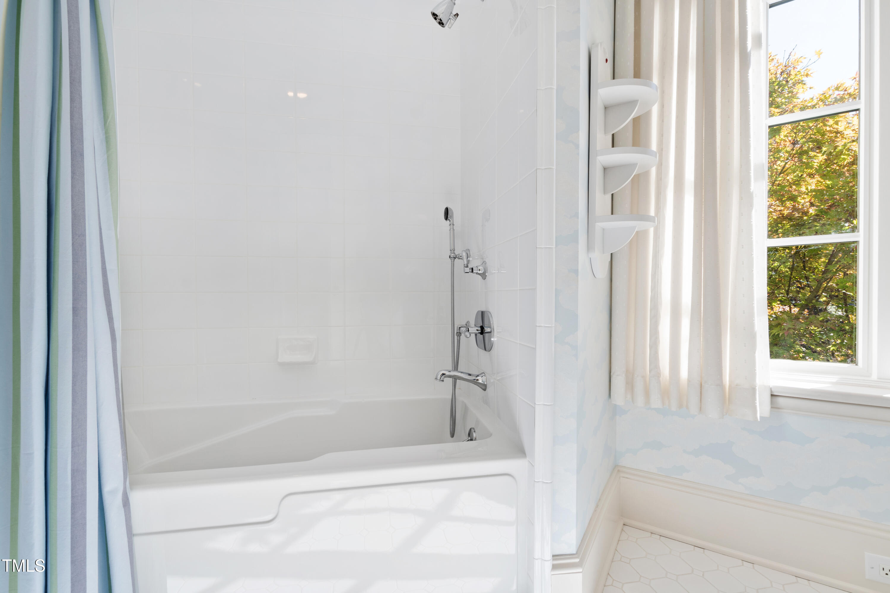 2658 Davis Street Raleigh, NC 27608 - Photo 66 of 99 a bathroom with a bathtub