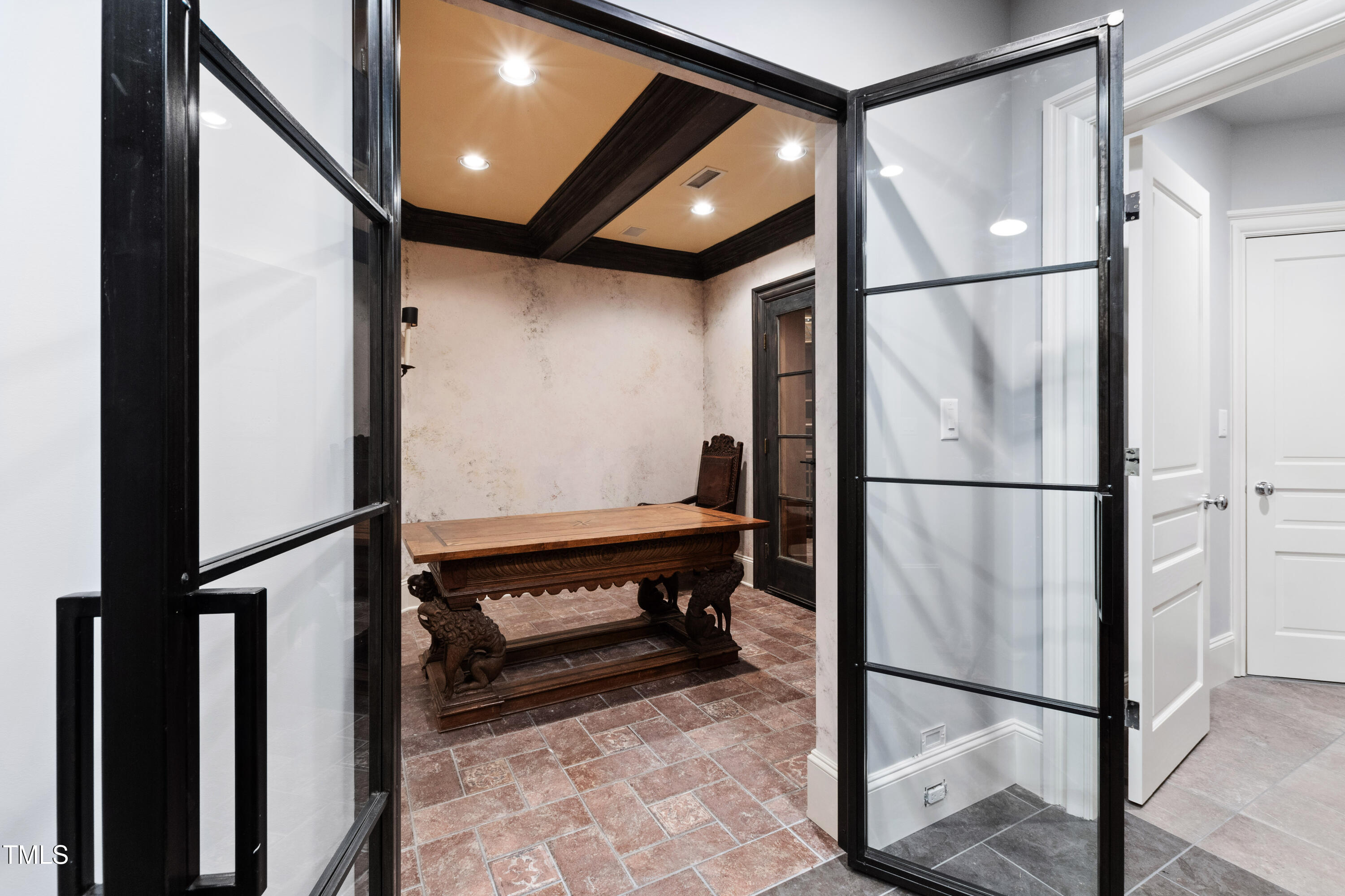 2658 Davis Street Raleigh, NC 27608 - Photo 75 of 99 a view of a hallway with wooden floor and furniture