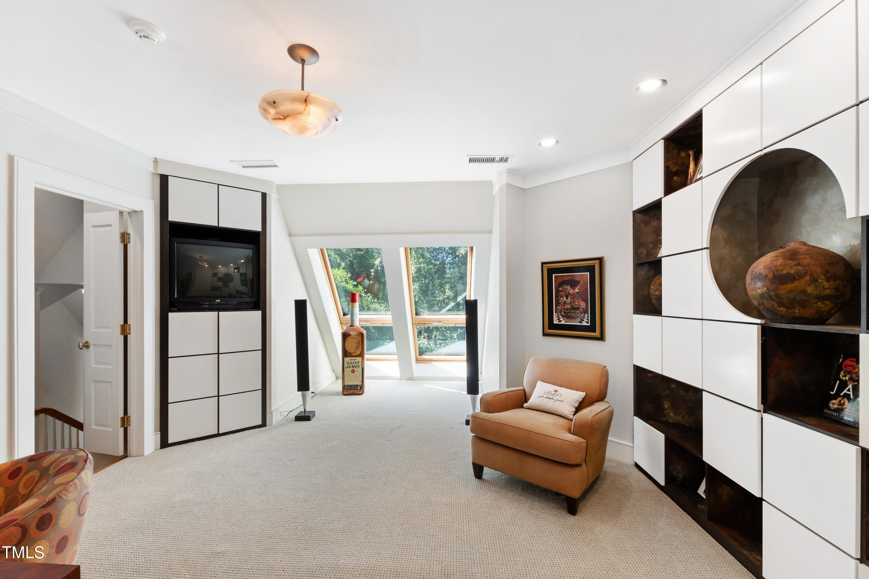 2658 Davis Street Raleigh, NC 27608 - Photo 88 of 99 a living room with furniture and a window
