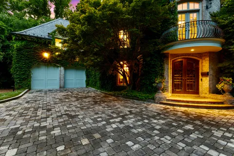 a view of entryway with wooden floor and stairs