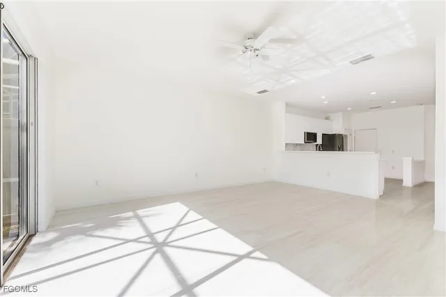 a view of a livingroom with a staircase