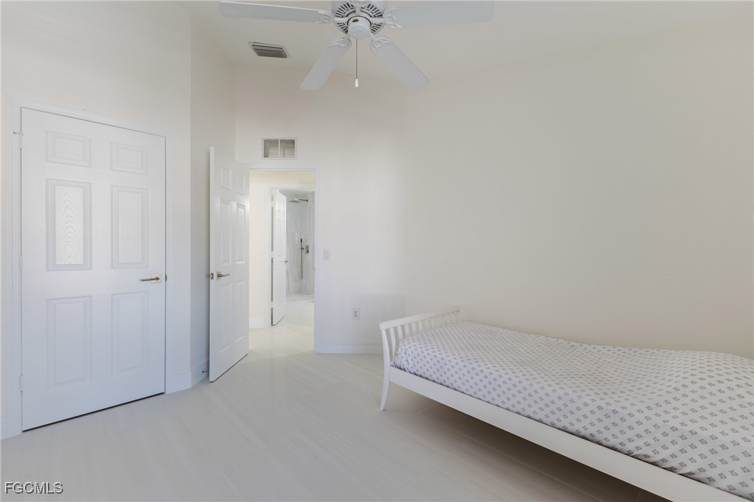 827 Hampton Circle, Unit 146 Naples, FL 34105 - Photo 25 of 36 a view of bedroom