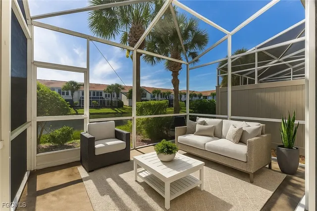 a view of swimming pool with a yard and seating area