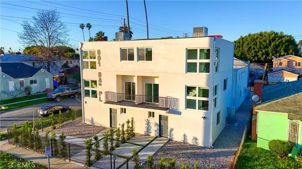 a view of building with glass windows