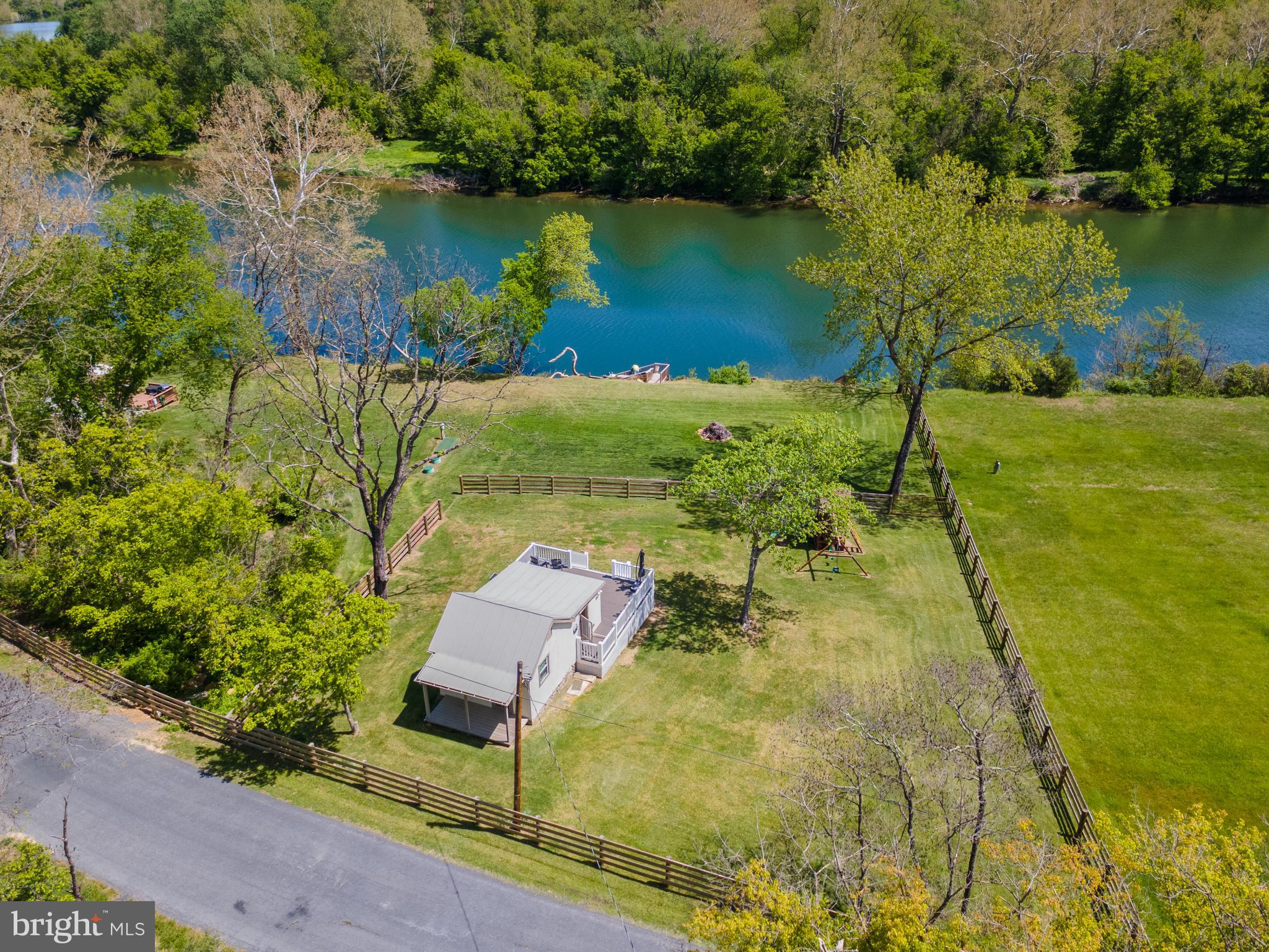 1449 Egypt Bend Road Luray, VA 22835 - Photo 11 of 48 an aerial view of a house with a yard and lake view