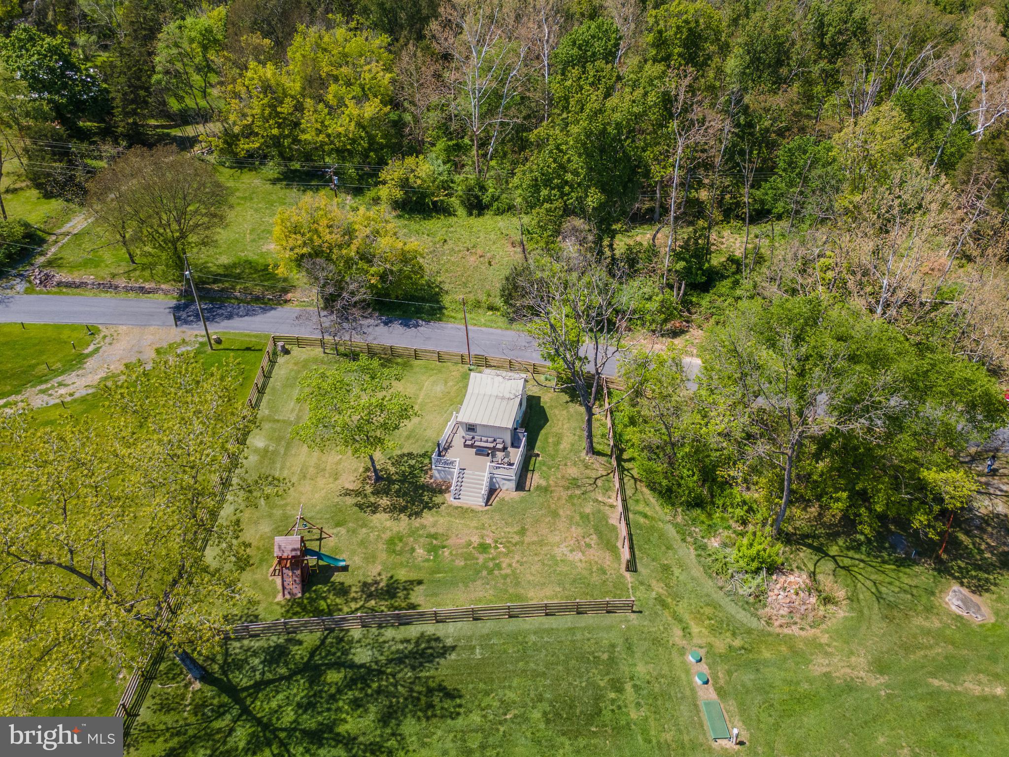 1449 Egypt Bend Road Luray, VA 22835 - Photo 25 of 48 a view of a yard with plants and large trees