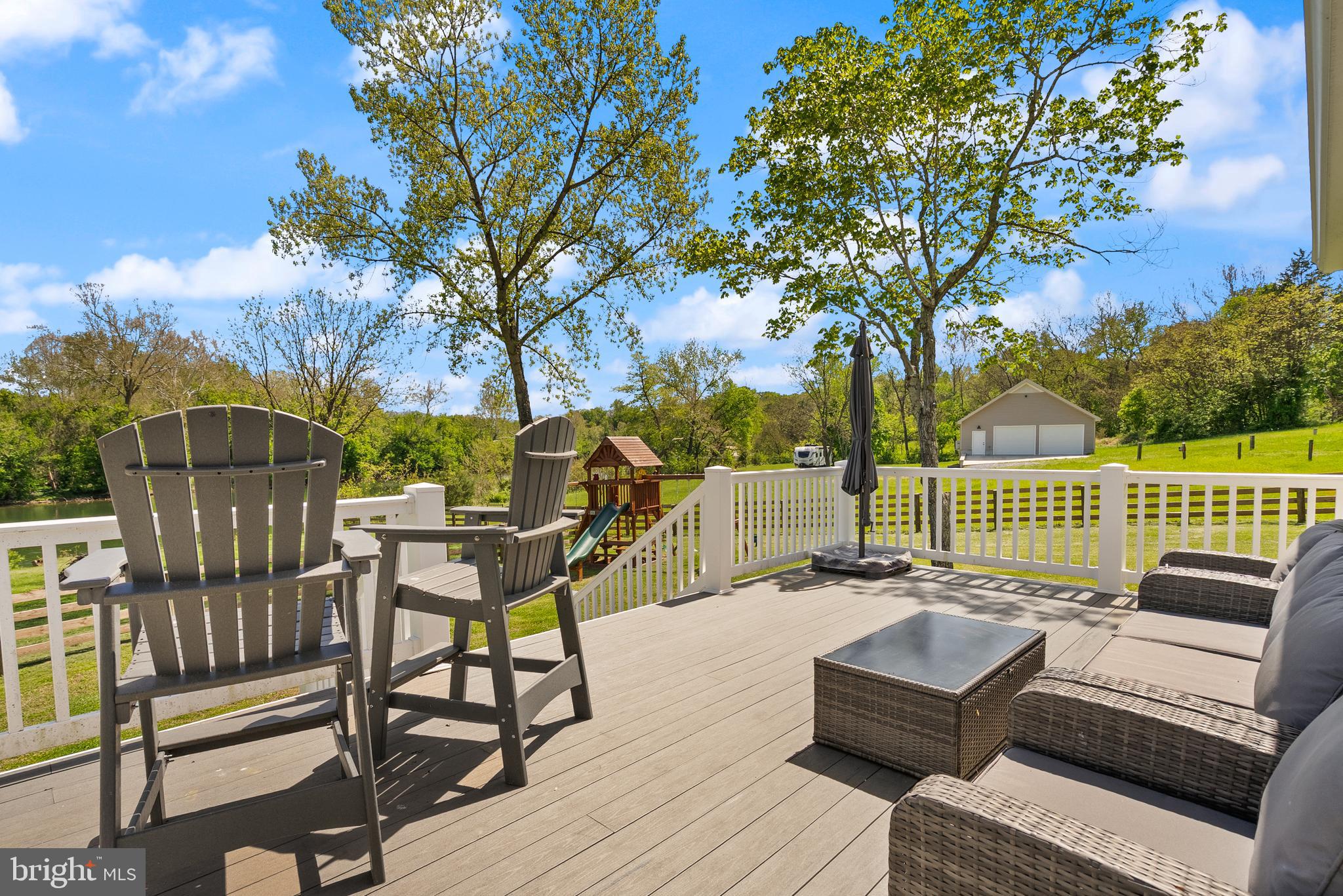 1449 Egypt Bend Road Luray, VA 22835 - Photo 41 of 48 a view of a chairs and table on the wooden deck