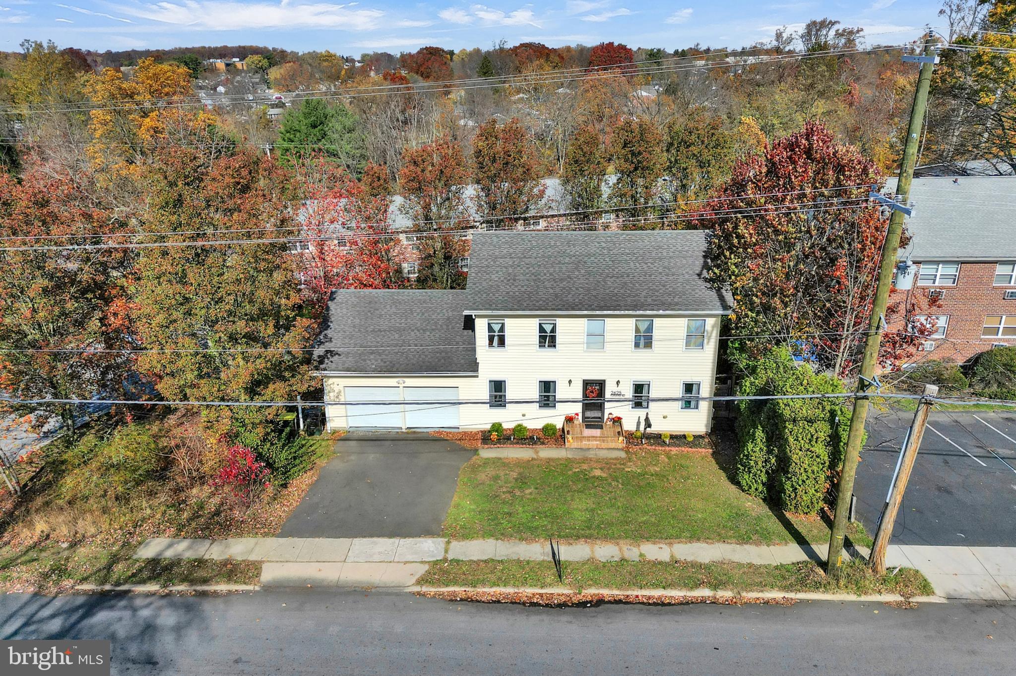 2625 Horsham Road Hatboro, PA 19040 - Photo 35 of 39 Charming home amidst vibrant autumn foliage.