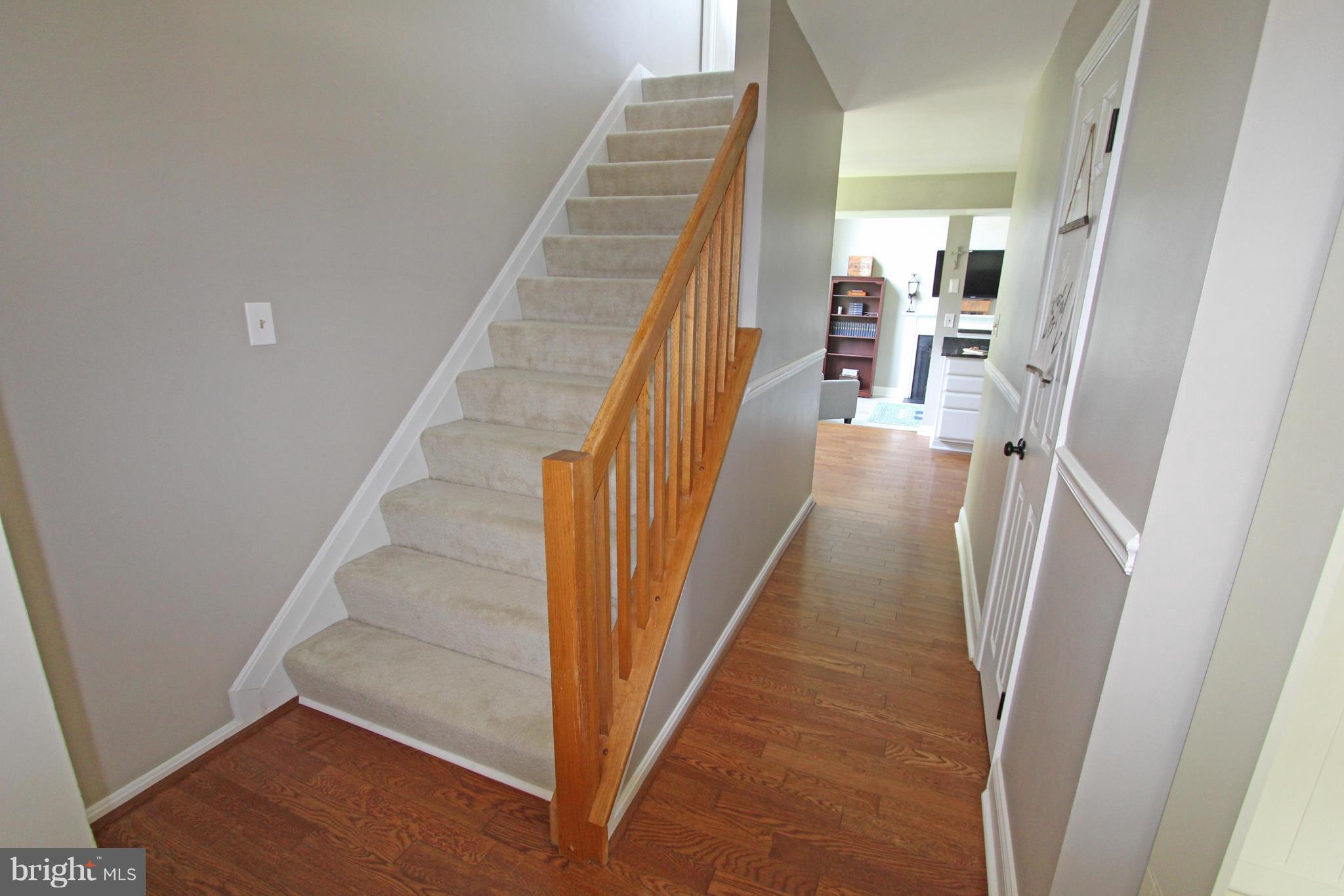 700 North Shamrock Road Bel Air, MD 21014 - Photo 7 of 26 Wide staircase & center hall to kitchen