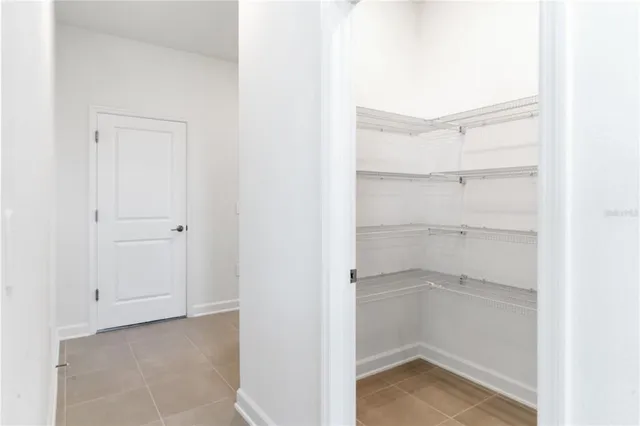 a view of kitchen and kitchen with center island