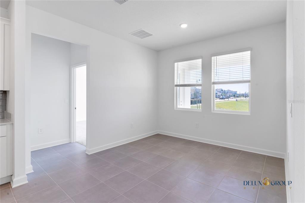 2947 Believe In Yourself Court Clermont, FL 34714 - Photo 19 of 50 an empty room with windows