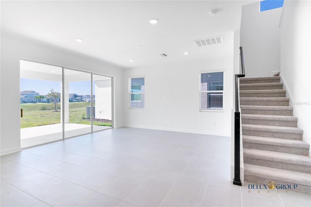 2947 Believe In Yourself Court Clermont, FL 34714 - Photo 21 of 50 a view of an entryway with wooden floor