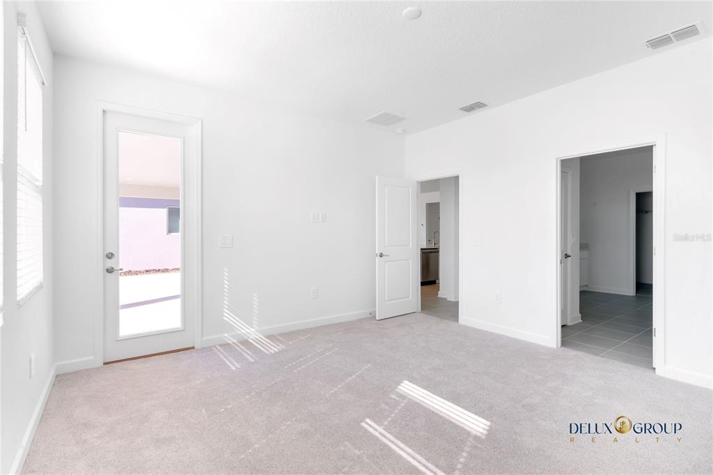 2947 Believe In Yourself Court Clermont, FL 34714 - Photo 26 of 50 a view of an empty room with a window